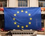 european union flag building — financial news