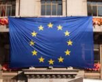 european union flag building — financial news