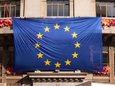 european union flag building — financial news