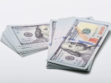 us dollar bills stack — financial news