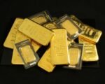 gold bars stacked — financial news
