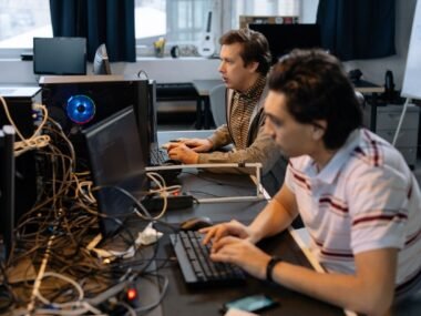 office workers computers — financial news