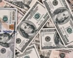 oil pump dollar bills — financial news