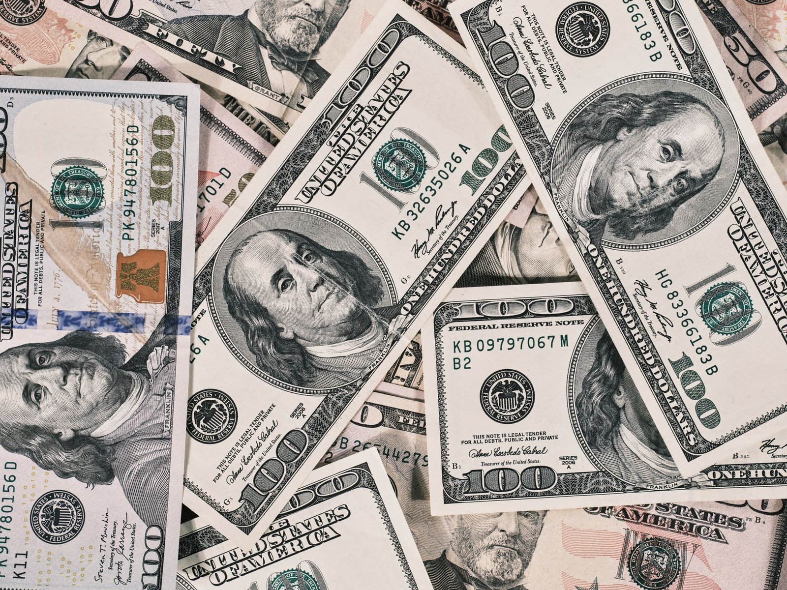 oil pump dollar bills — financial news