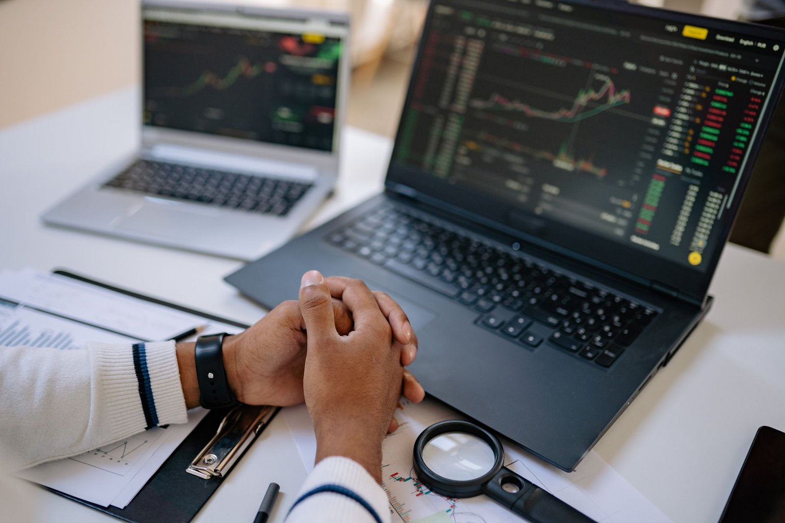 stock exchange trading floor screens — financial news