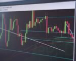 stock exchange trading floor screens — financial news