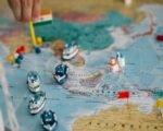 world map economic flags — financial news